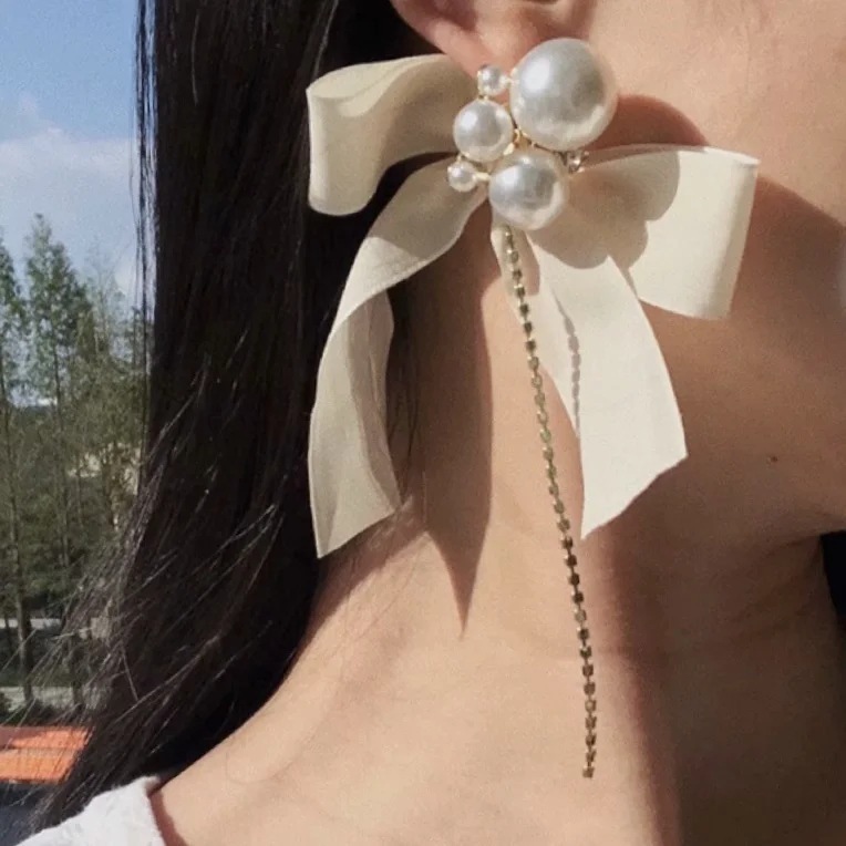 Pearl butterfly knot with long tassel silver needle Earrings
