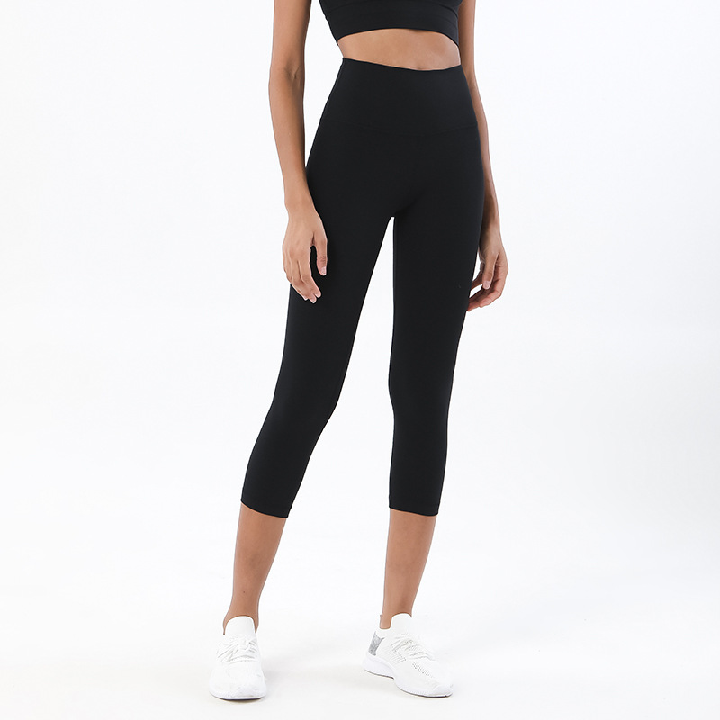 Pantalones cortos desnudos cepillados de doble cara pantalones de yoga pantalones de cintura alta de Europa y América de las mujeres de elevación de la cadera melocotón Pantalones deportivos de fitness