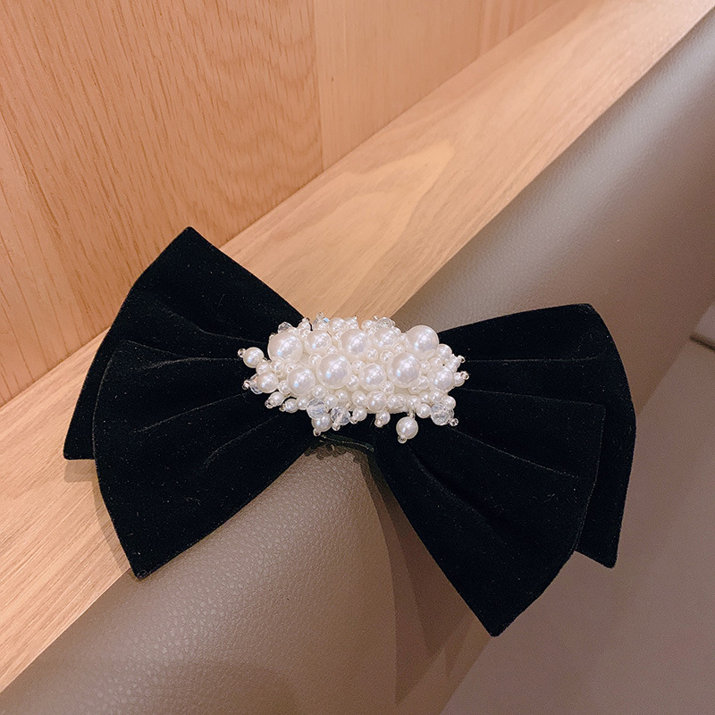 Korean Pearl Bow Diamond Hairpin Niche Cute Side Clip Top Clip Back Head Clip display picture 3