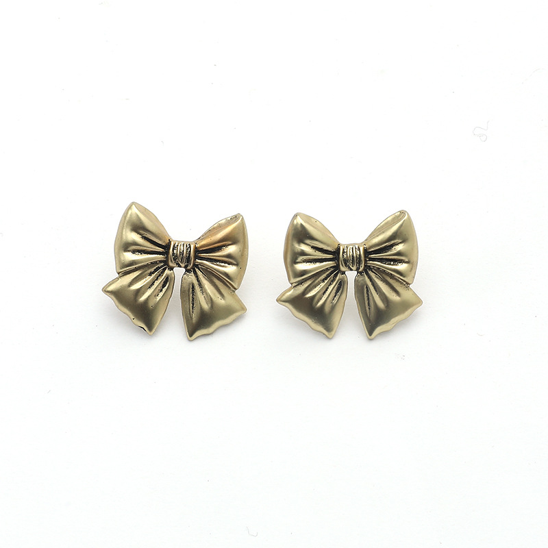 Retro Distressed Metal Bow  Korean Fashion Simple  Earrings display picture 4