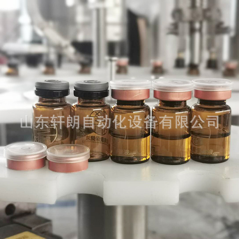 口服液灌装线 液体精油轧盖灌装机 药品糖浆轧盖下盖锁盖一体机