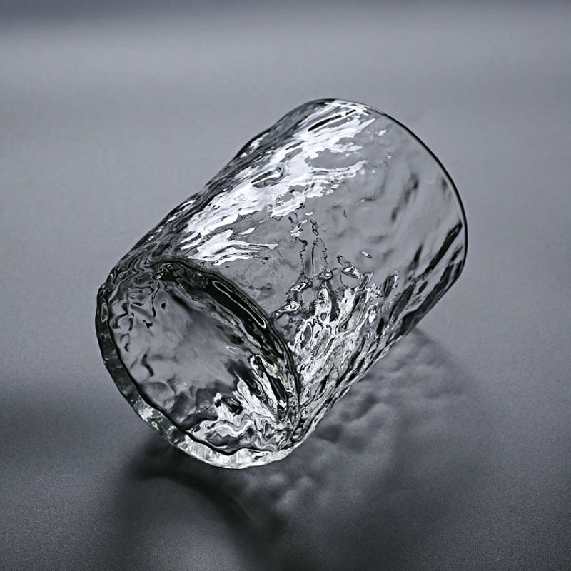 Fábrica al por mayor patrón de martillo japonés vidrio borosilicato material de vidrio resistente al calor Taza de una sola capa patrón de árbol de la casa taza de té