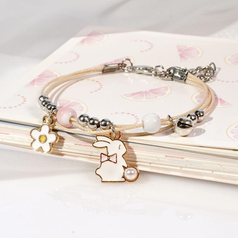 2023 nueva pulsera popular creativa de cerámica tejida de dibujos animados para mujer, joyería de tocador, miel, pareja, estudiante, regalo pequeño, joyería de conejo