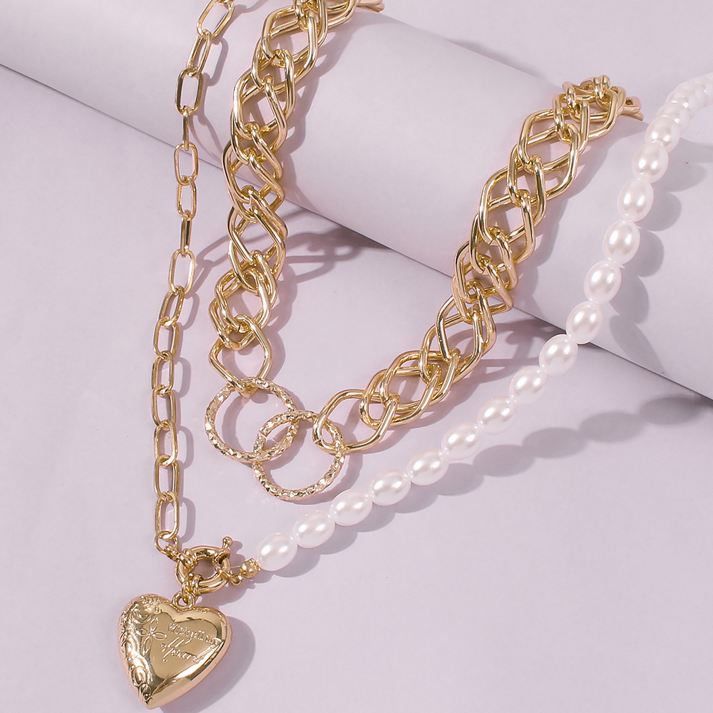 Fashion Punk Style Alloy Pearl Fashion Heart-shaped Pendant Texture Multilayer Chain Women's Necklace display picture 7