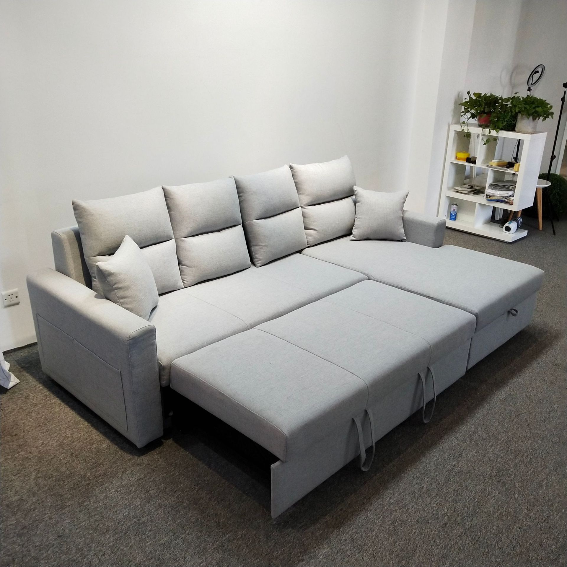 Tecnología de tela de esquina sofá correa de almacenamiento VIP simple sala de estar moderna pequeña combinación de sofá cama plegable doble uso