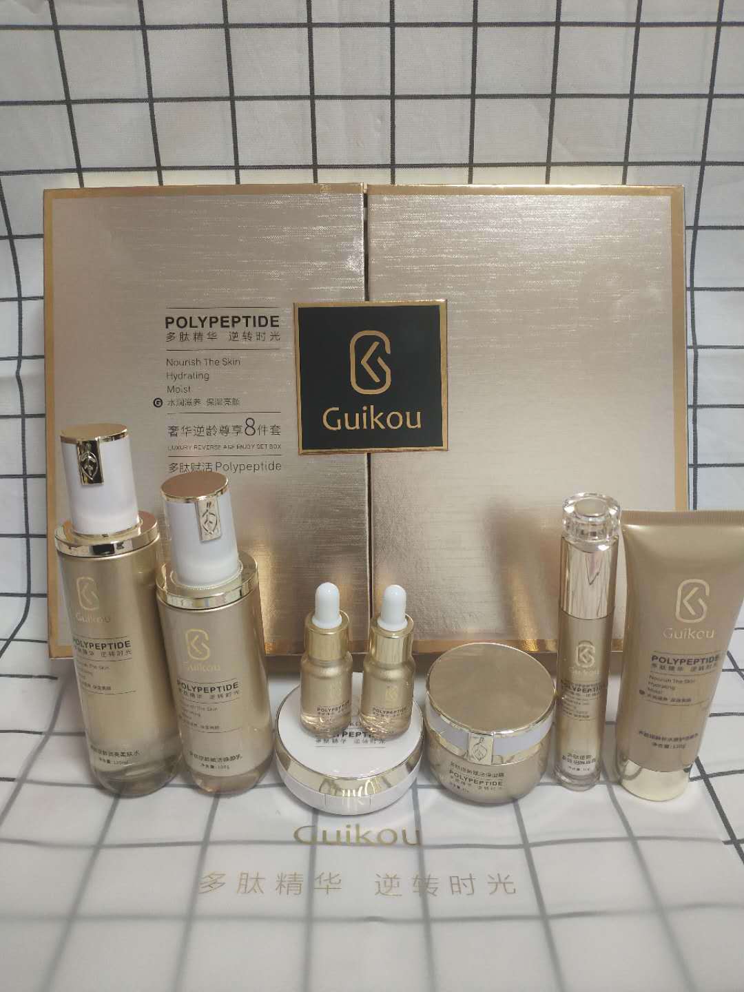 Guikou luxury anti-aging exclusive eight-piece set hydrating repair water cream facial cleanser eye cream air cushion liquid essence set