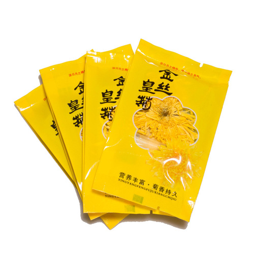 A single Huangshan Golden Silk Chrysanthemum in a cup, wholesale large chrysanthemum tea, one flower per brew, bagged Golden Silk Chrysanthemum.