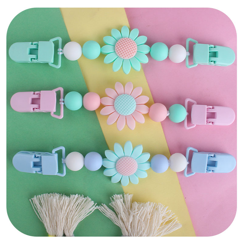 Bebé suministros girasol chupete cadena pañuelo clip bebé calmante silicona Juguete plástico clip de doble cabeza