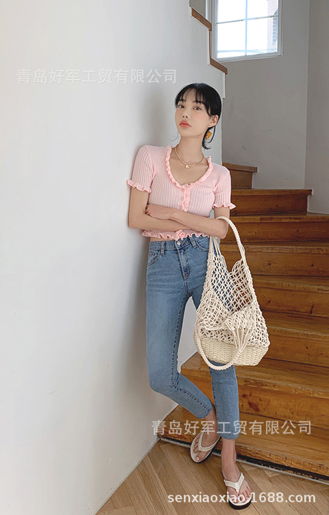 Retro Hollow Straw Woven Solid Color Bucket Bag Wholesale Nihaojewelry display picture 1