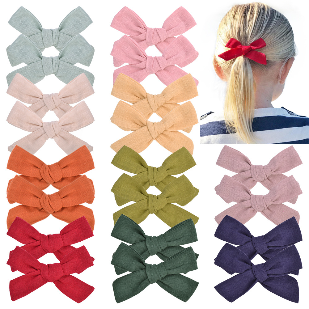 Fashion New Style Solid Color Fabric Bow Hairpin display picture 1
