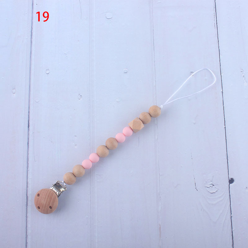 Nueva fábrica directa bebé Beech juguete mordedor bebé chupete de silicona pezón anti-gota cadena materna y infantil suministros