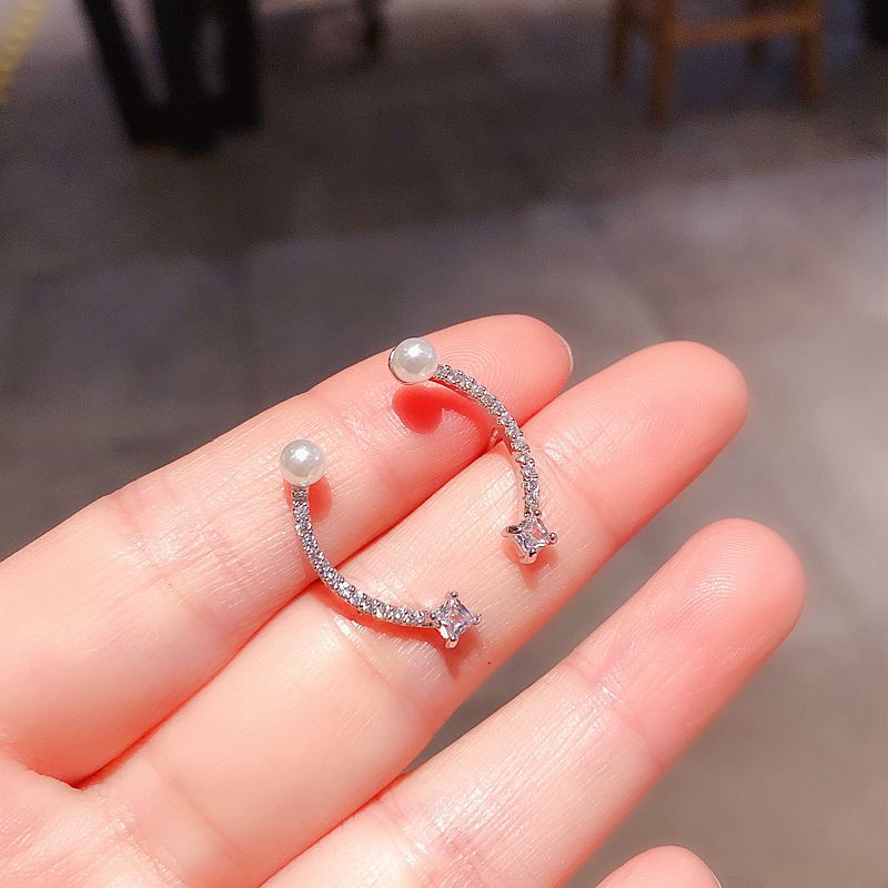 Korean Imitation Pearl Curved Zircon Micro-inlaid Earrings Wholesale Nihaojewelry display picture 2