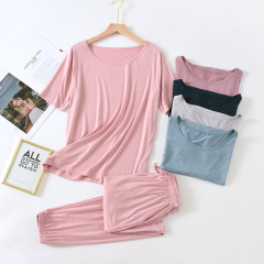 純色のパジャマ女性の夏の半袖のズボンのモーダルの薄いタイプのゆったりしているシンプルな家庭服のカジュアルな服は外に着ることができます。