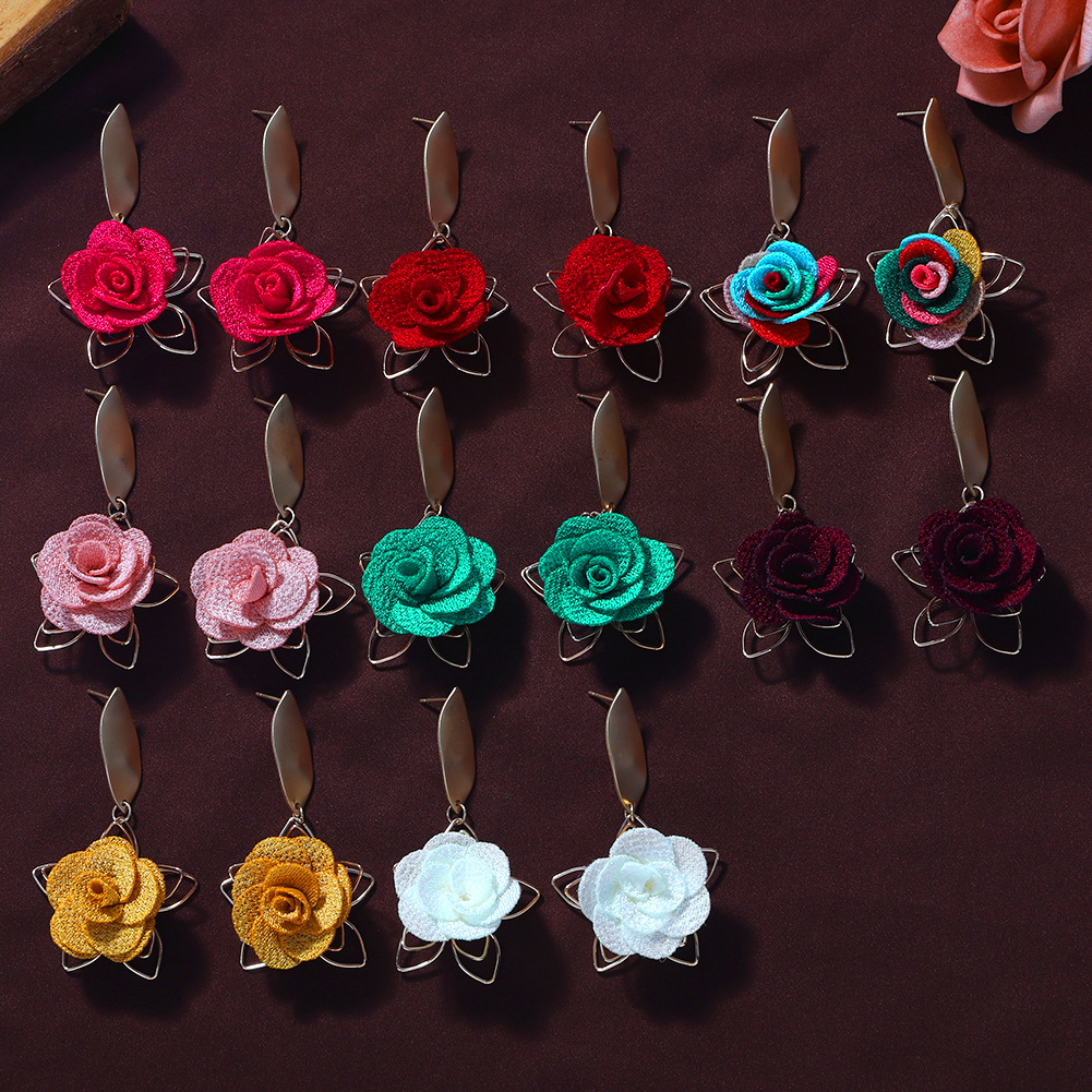 Exquisite Hollow Fabric Flower Earrings Female Korean Fashion New Alloy Pentagram Earrings Female display picture 4