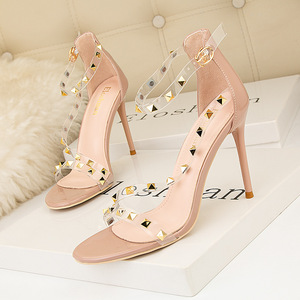 Slim heel ultra-high heel rivet shallow mouth pointed head sexy hollowed out one line strap transparent sandals