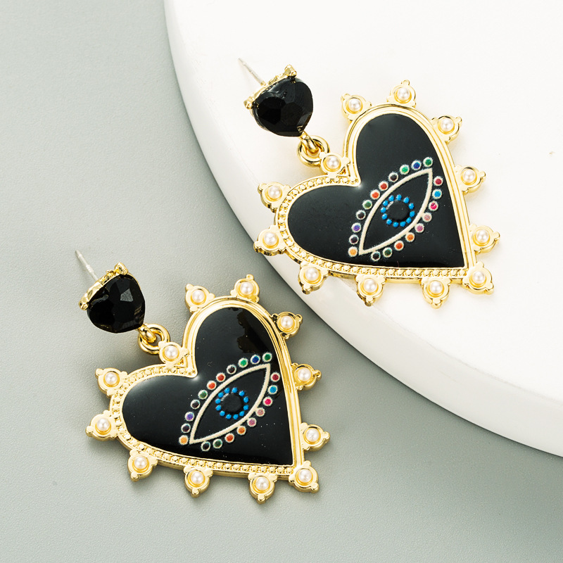 Heart-shaped Devil's Eyes Pearl Alloy Earrings display picture 3