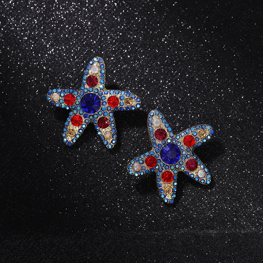 Pendientes Salvajes De Diamantes De Color De Estrella De Mar Personalizados De Moda Súper Flash De Cinco Puntas En Forma De Estrella Lindos Pendientes De Temperamento Japonés Y Coreano Al Por Mayor display picture 5