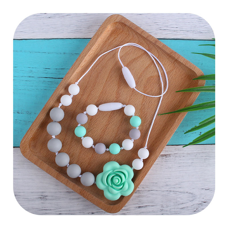 Venta caliente forma de Rosa collar de silicona mordedor masticable colgante infantil molar mordedor de silicona pulsera de cuentas