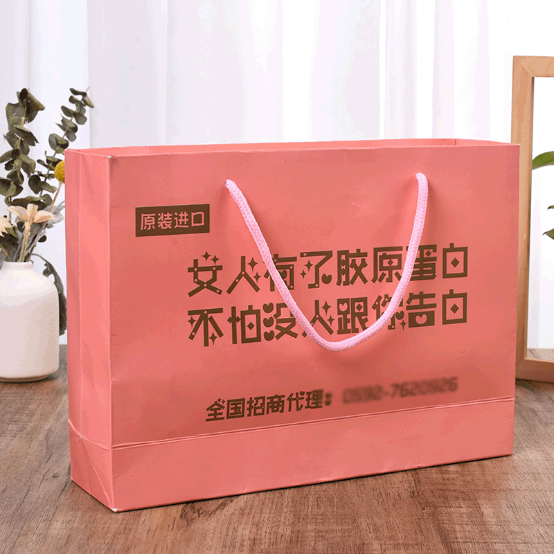 厂家批发化妆品男女服装购物袋简约白卡手提袋企业广告宣传袋