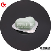 一次性小盒装牛油包装机  模具可定制  橄榄油/黄油泡罩灌装机