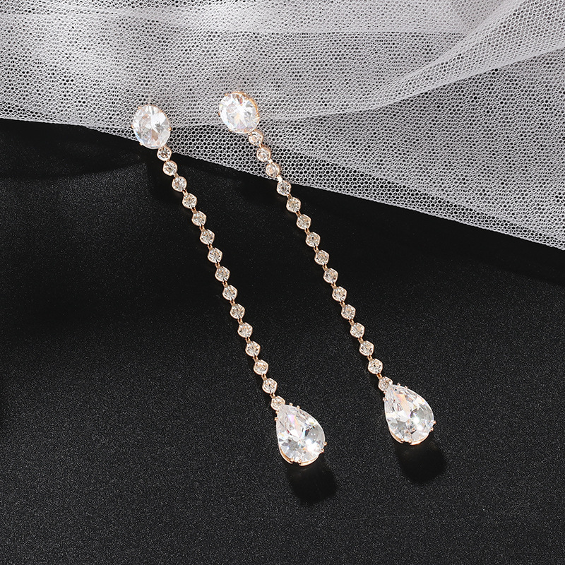 Pendientes de lujo coreanos y japoneses con microincrustaciones de circonita en forma de gota de agua para adelgazar el rostro, elegantes con incrustaciones de diamantes._voghion.com