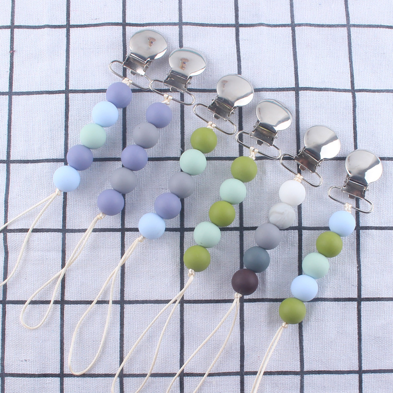 Cadena de pezón de silicona calmante Nuevo clip de hierro clip de pezón Dispositivo de molienda de dientes de bebé cadena anti-caída cadena anti-perdida