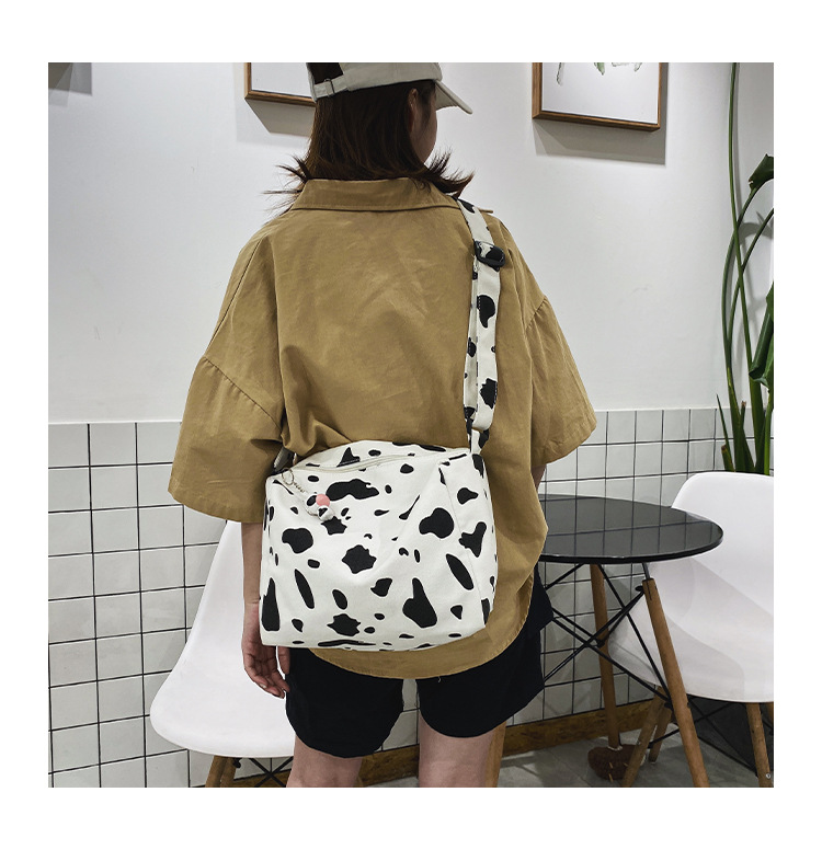 Korean New Simple Lazy Style Cute Cow Polka Dot Student Canvas Bag Class Bag Wild Messenger Bag Wholesale display picture 39