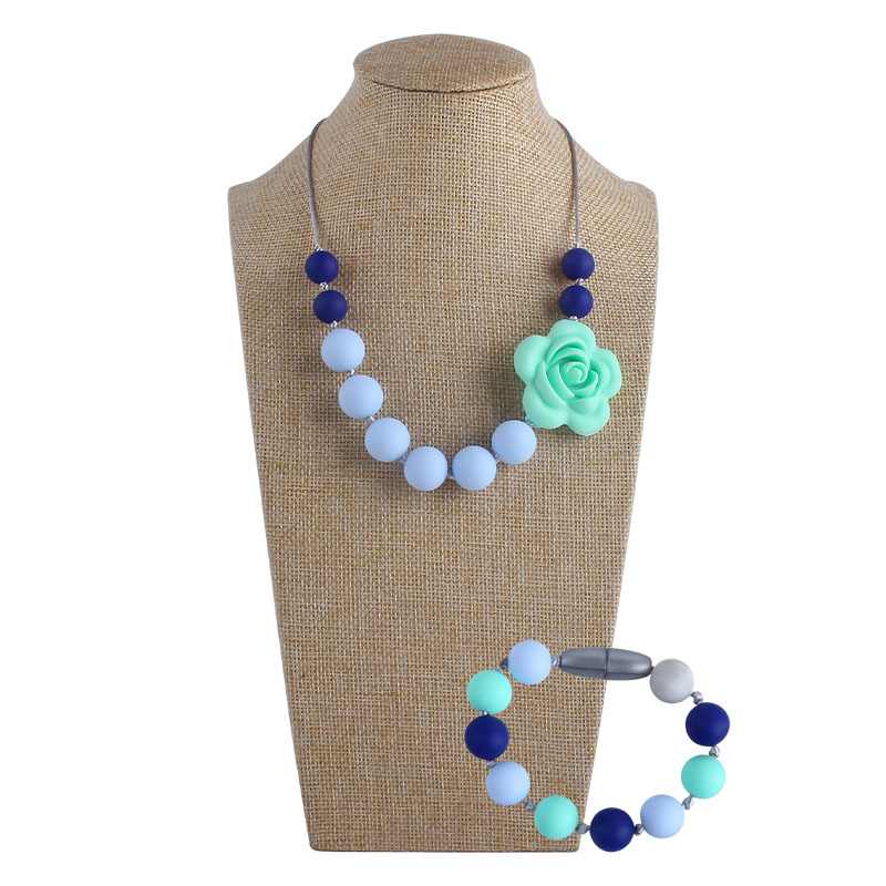 Venta caliente forma de Rosa collar de silicona mordedor masticable colgante infantil molar mordedor de silicona pulsera de cuentas