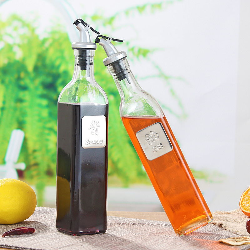 Fábrica al por mayor cocina botella de aceite de vidrio 300ml aceite de oliva olla boquilla de aceite 500ml salsa de soja vinagre tarro hogar