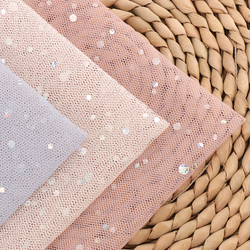 厂家供应 大小镭片网纱 网眼布裙纱舞台服装面料女装童装包装网布