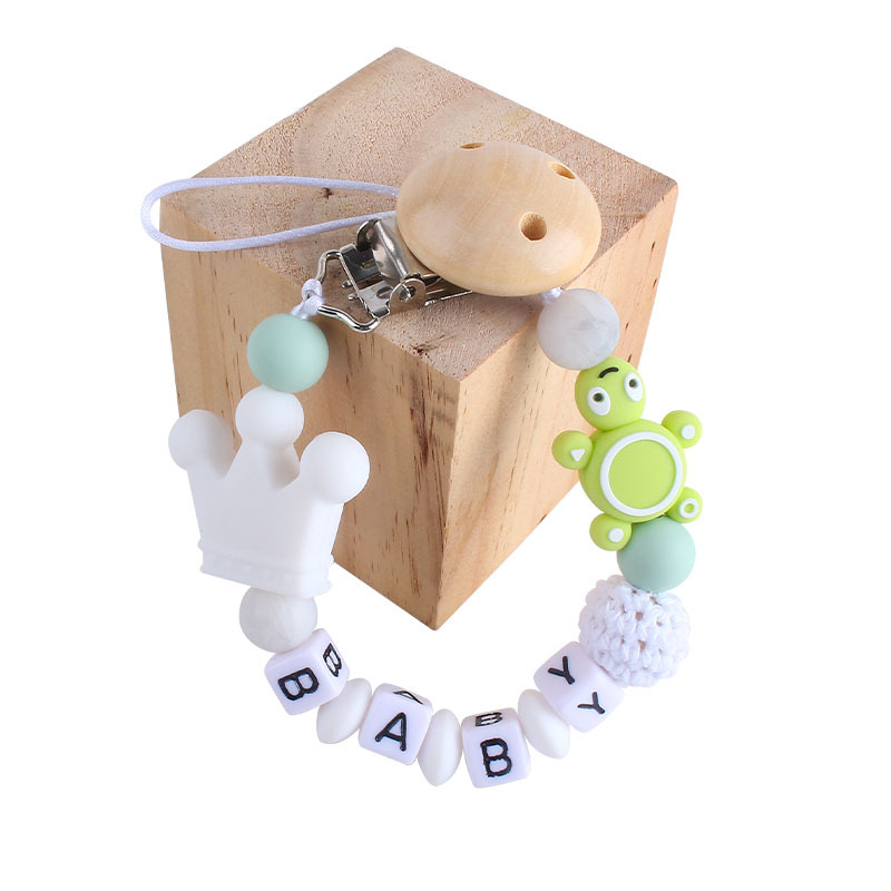 Bebé de plástico carta chupete clip bebé calmante corona de silicona tortuga mordedor chupete cadena anti-gota cadena