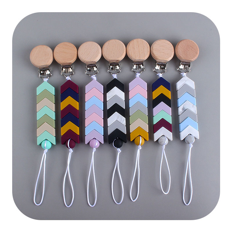 Nuevo bebé haya chupete clip bebé creativo calmante silicona flecha marca mordedor chupete cadena anti-gota cadena