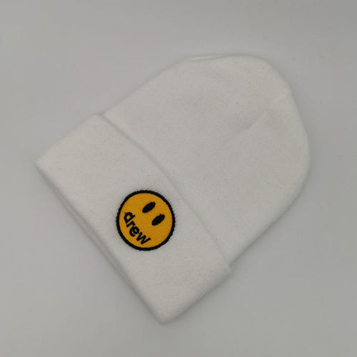 Adult yellow label smiley draw cold hat for men and women knitted hat spring, autumn and winter warm woolen hat couple hat student hat