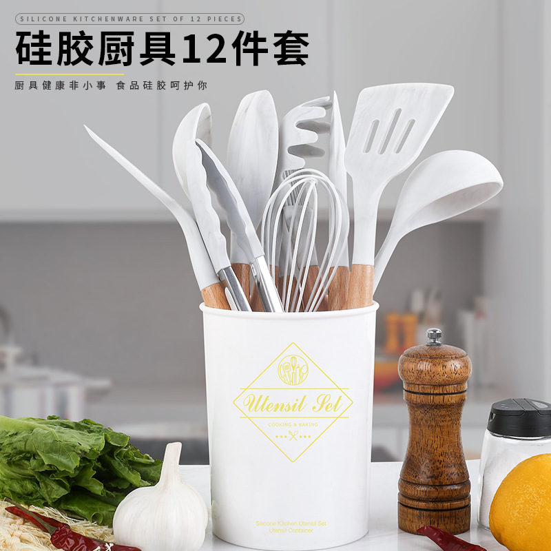 Wooden handle silicone kitchen utensils...