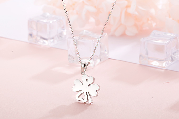 new stainless steel hollow four-leaf clover clavicle necklace earrings two-piece set wholesale