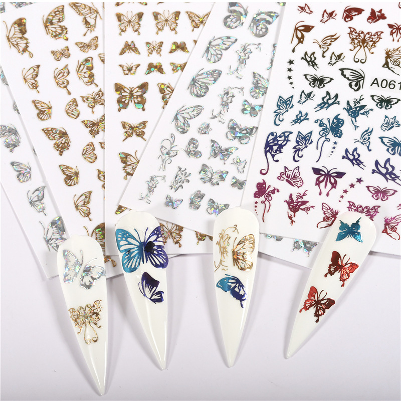 Pegatinas de uñas populares transfronterizas traje pegatinas de mariposa láser hueco pegatinas de uñas de mariposa luminosa colorida traje