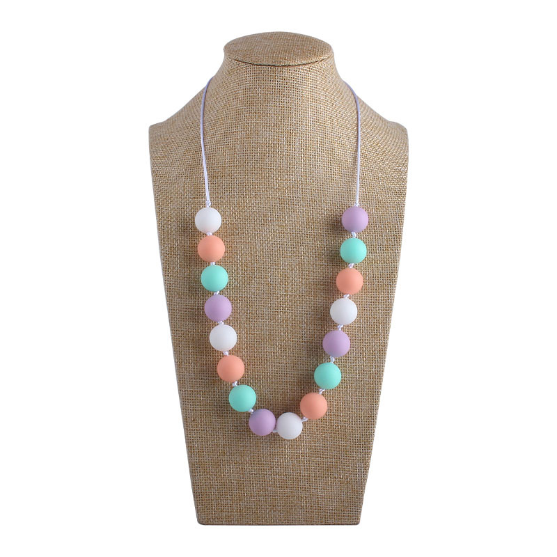 Comercio exterior Amazon collar nuevo bebé molar silicona mordedor collar masticable colgante mordedura gel mordedor palo