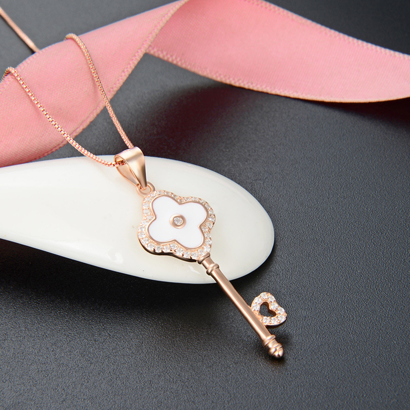 Japonés y coreano s925 Collar de plata simple Otoño e Invierno colgante clave de la moda de las mujeres del todo-fósforo aceite goteo joyería de una sola pieza de entrega