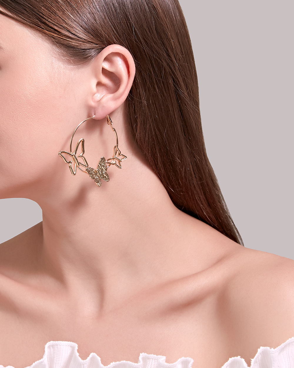 Nouvelle Personnalité Simple Exagérée Boucles D&#39;oreilles Trois Papillons Creux En Gros display picture 3