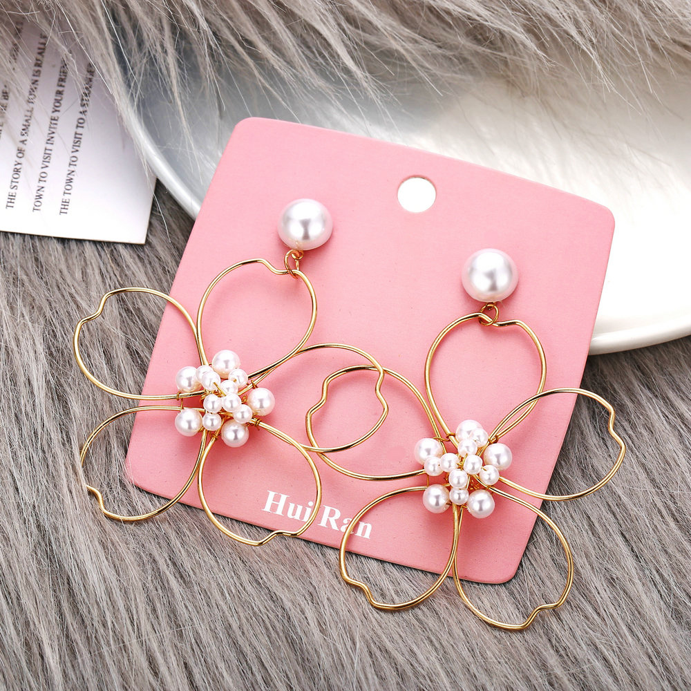 5041151 Han Zhi Shang Europäische Und Amerikanische Neue Blumen Perlen Ohrringe Kreative Retro Einfache Gänseblümchen Blumen Ohrringe display picture 5