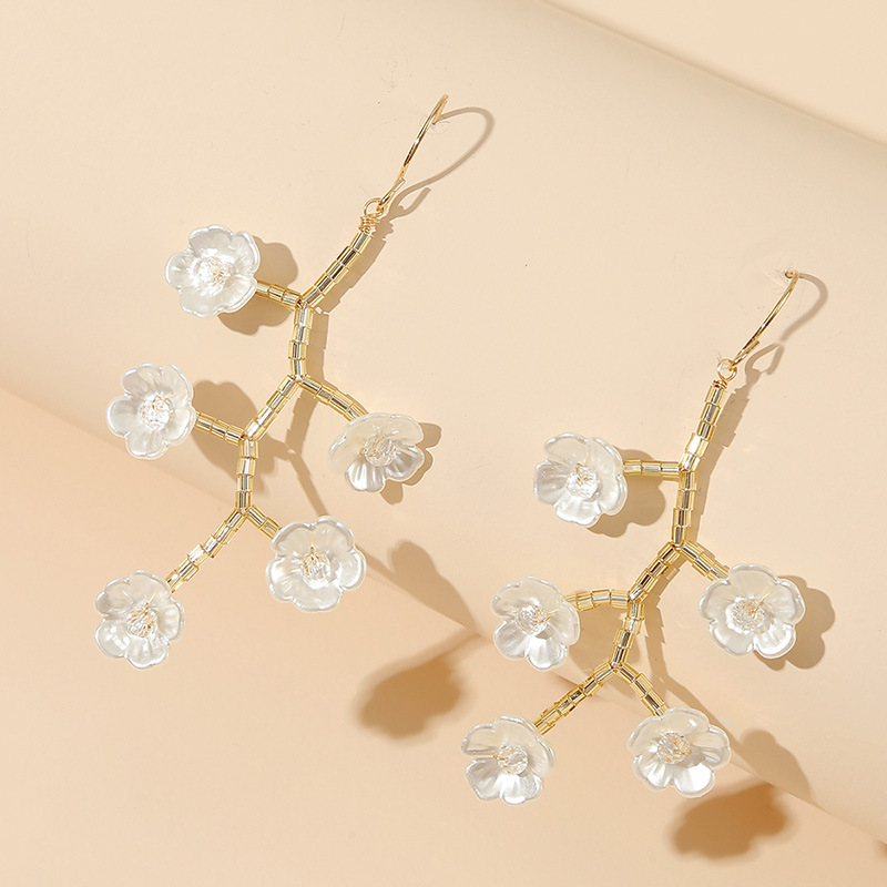 Korean  Long Hand-made Imitation Shell Tree Branch Flower Earrings New Trend Woven Crystal Earrings Jewelry Wholesale Nihaojewelry display picture 9
