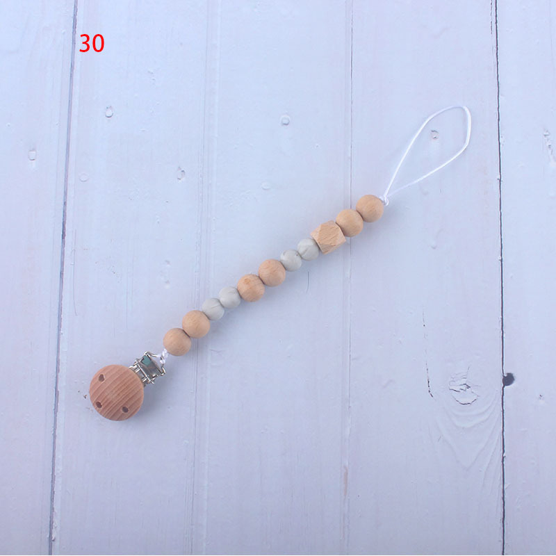 Nueva fábrica directa bebé Beech juguete mordedor bebé chupete de silicona pezón anti-gota cadena materna y infantil suministros