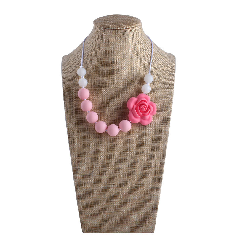 Venta caliente forma de Rosa collar de silicona mordedor masticable colgante infantil molar mordedor de silicona pulsera de cuentas