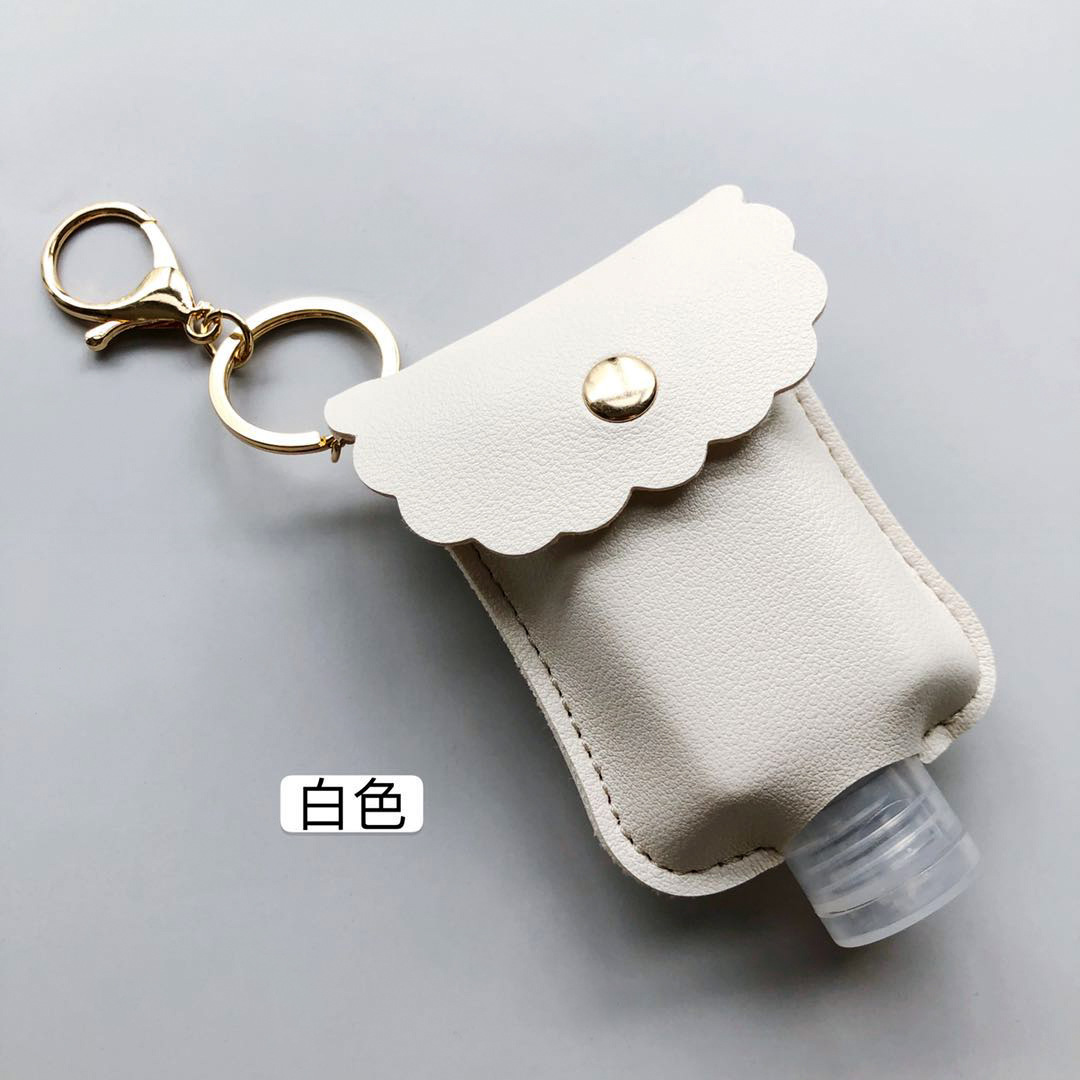 En stock mano desinfectante libre botella de cuero caso estudiante mochila desinfectante llavero colgante de cuero caso 60ml desinfectante de manos botella