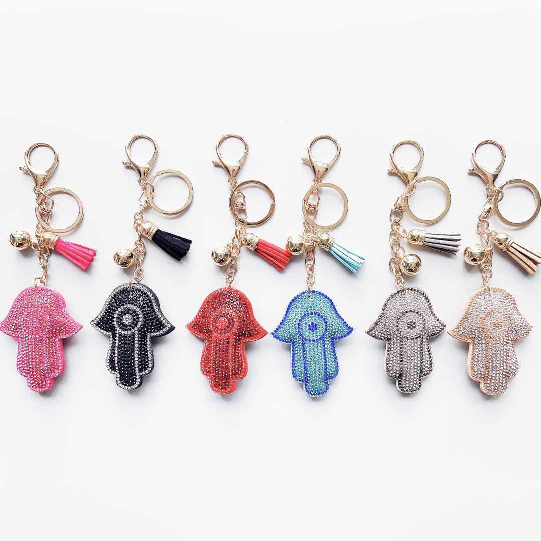 Venta caliente transfronteriza de Palma llavero coreano terciopelo rhinestone gato ojo llavero bolsa colgante accesorios en stock