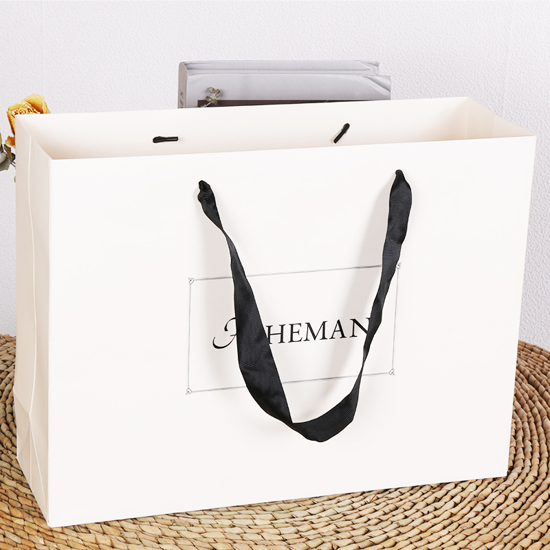 服装店手提袋子印刷logo高档女装牛皮纸袋品牌购物袋化妆品包装袋
