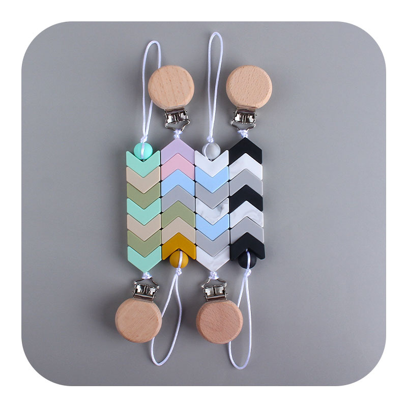 Nuevo bebé haya chupete clip bebé creativo calmante silicona flecha marca mordedor chupete cadena anti-gota cadena