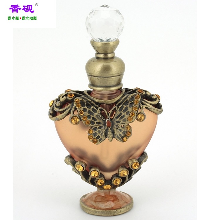 Botella de perfume al por mayor esencia sub-botella 10ml melocotón corazón aceite esencial botella de perfume tatuaje botella de bordado aromaterapia adornos de joyería
