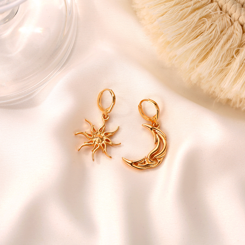 Asymmetrical Short Hollow Star And Moon Earrings display picture 7