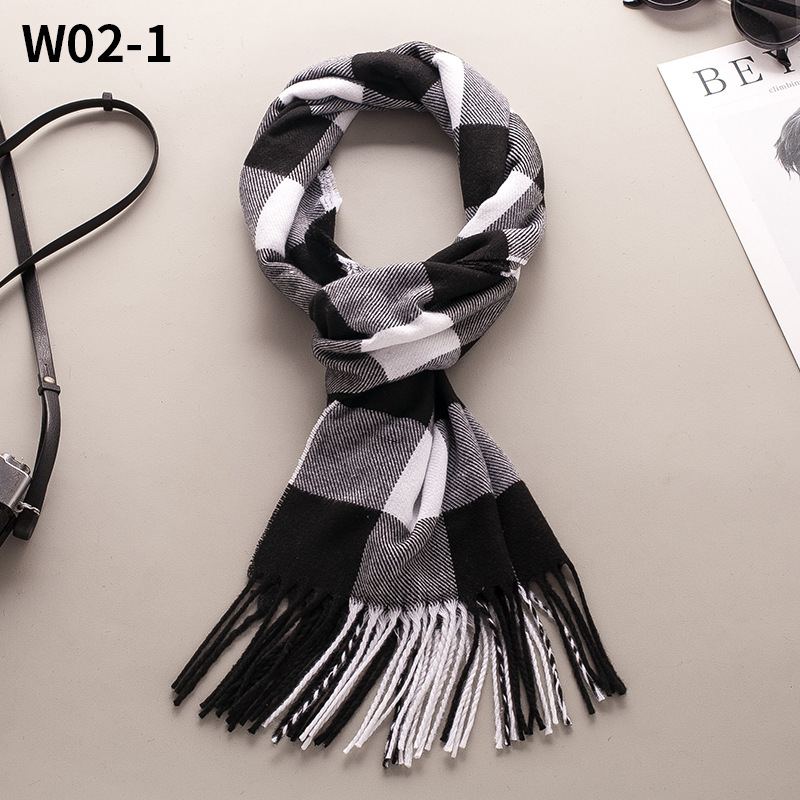 Demi-season scarf made of faux fur with tassels